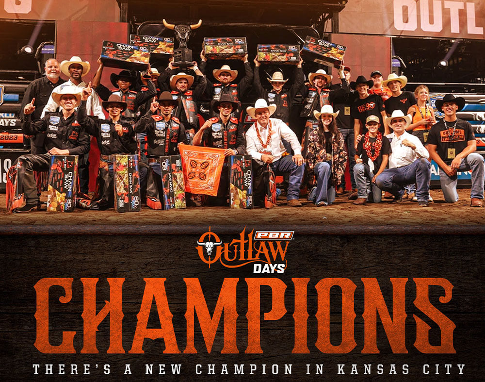 The Kansas City Outlaws holding up their Bad Boy Mowers E-Series Chainsaws at Outlaw Days 2023.