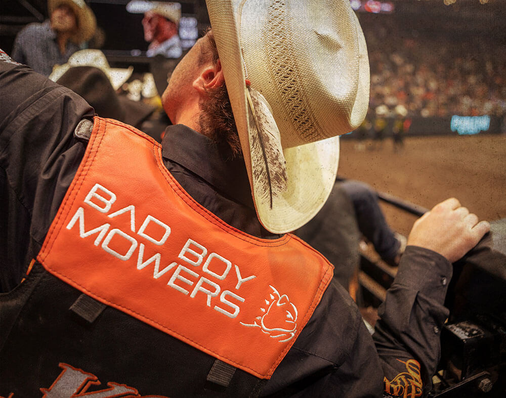 The Kansas City Outlaws showing off their gear with Bad Boy Mowers logo on the back.